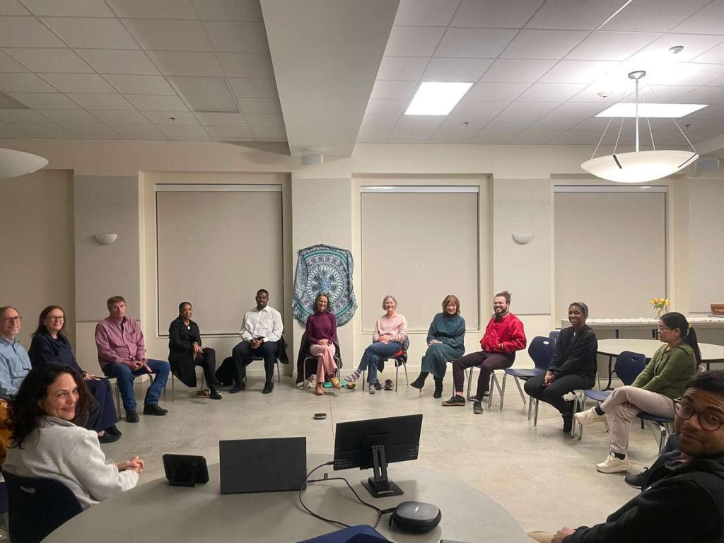 Group discussing talk Monday evening